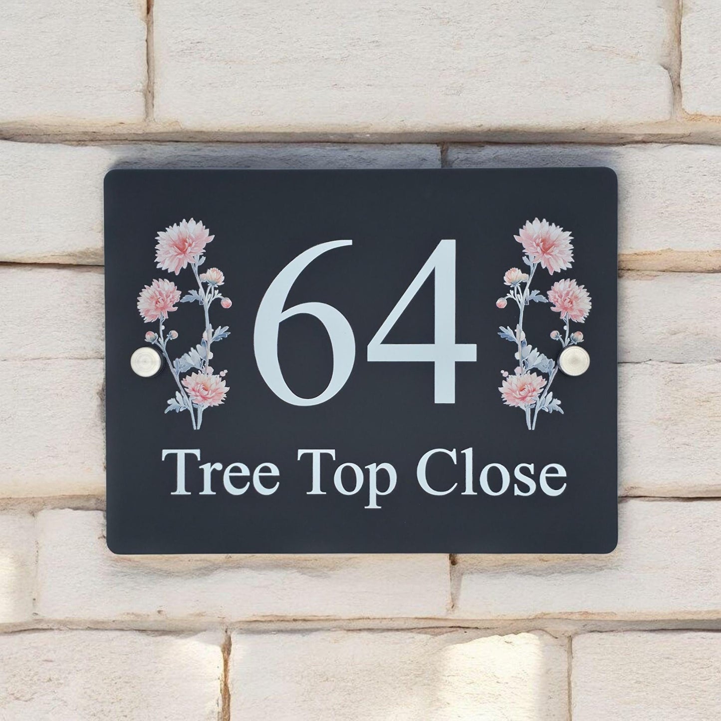 Weatherproof outdoor signage showing a decorative floral house number plate with modern, easy-to-read typography