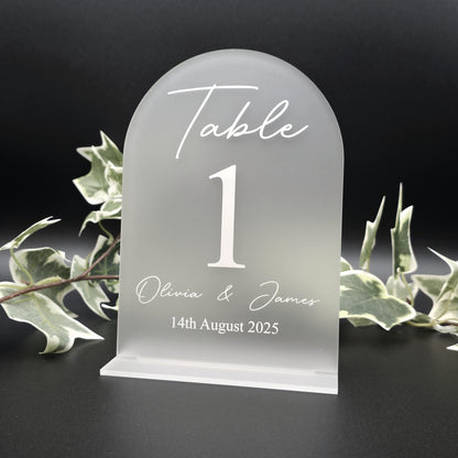 Personalised acrylic seating chart with guest names wedding table number