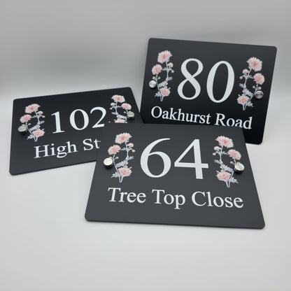 Custom floral address plaque with a vibrant printed design, enhancing the kerb appeal of a home&#39;s exterior