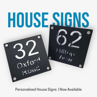 Wall-mounted floral house number sign with a personalised address, designed for easy visibility