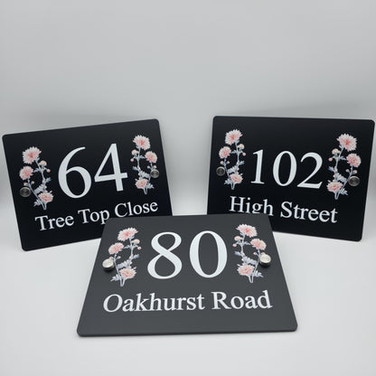 Custom-made acrylic house number plaque with an elegant floral print for a contemporary home exterior